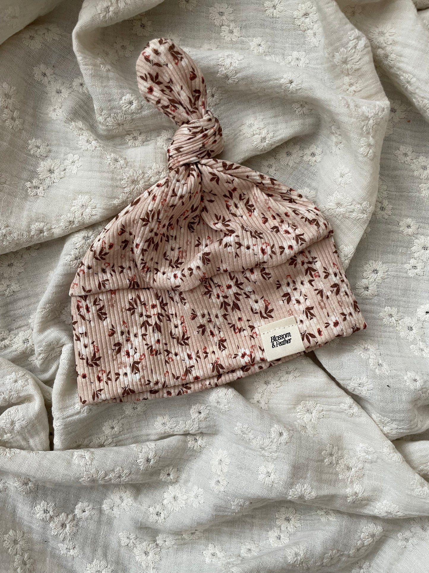 Knoopmutsje rib | Livia